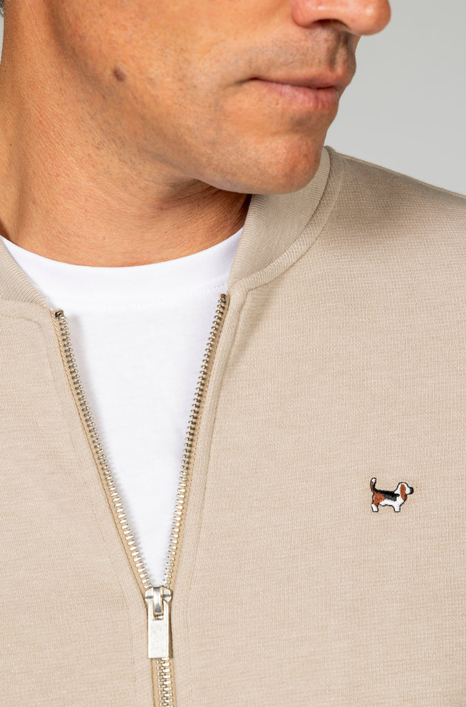 Sudadera bomber cremallera bolsillo crema